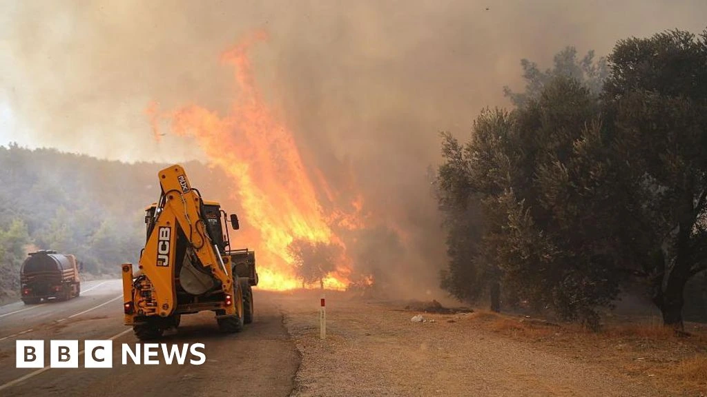 Two firefighters die in Crete as wildfires threaten parts of southern Europe