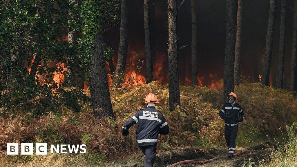 France fire crews face searing heat in battle to contain flames